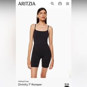 NWT black divinity romper 7”